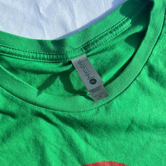 Banksy military peace Print graphic on Next Level apparel tee Kelly Green Size M - Picture 3 of 5